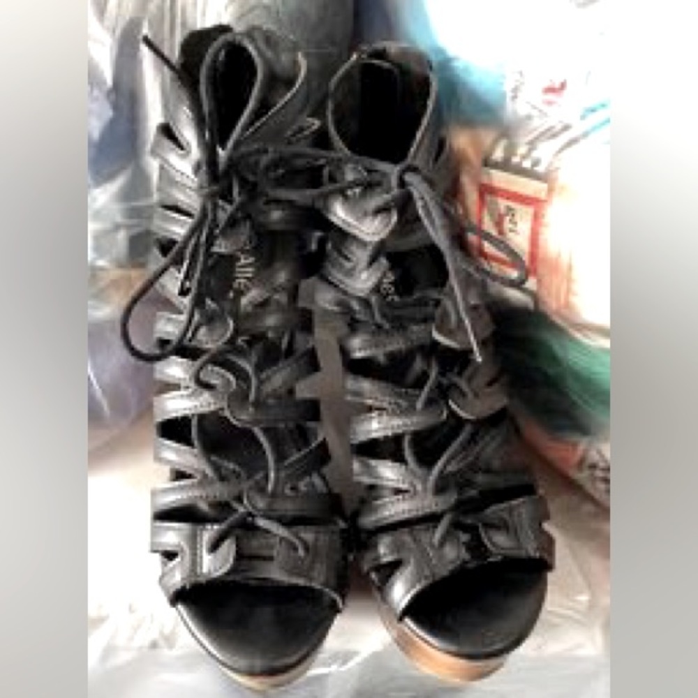 Sandals Size 8 with a 6” wedge heel.